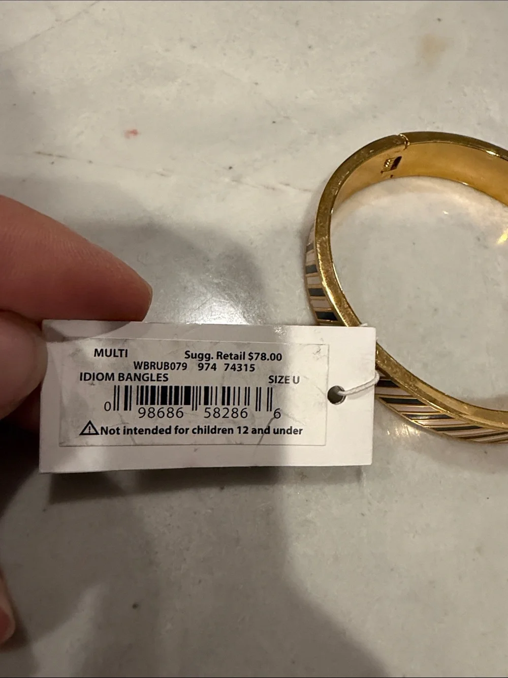 Gold-Tone Black and White Striped Bangle Bracelet